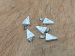 Bulk wholesale Howlite triangle-shaped crystal pendant from GemstoneGO, showcasing smooth white stone with subtle gray veining.
