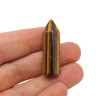 Tiger Eye obelisk tower crystal, 40mm gemstone from GemstoneGO, showcasing its golden-brown polished stone with natural striations.