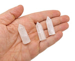 Clear quartz obelisk tower crystal from GemstoneGO, 40mm, with a polished, pointed crystal design perfect for meditation and decor.