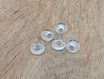 Clear quartz crystal donut pendant, 18mm Pi stone by GemstoneGO, showcasing a polished, transparent gemstone with a smooth, rounded shape.