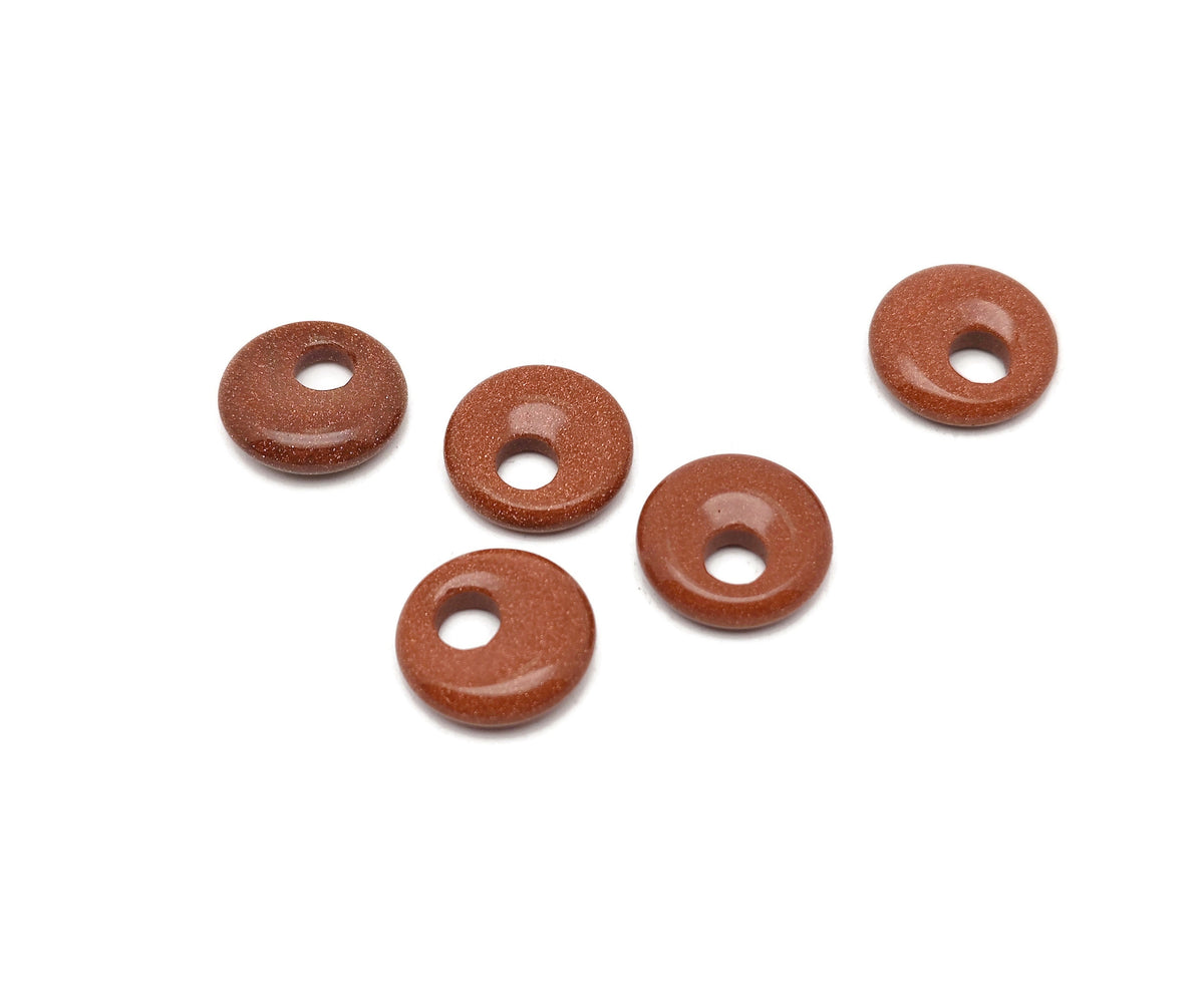 Goldstone crystal donut pendant with a pi symbol design, 18mm size, crafted by GemstoneGO with a polished, sparkly finish.