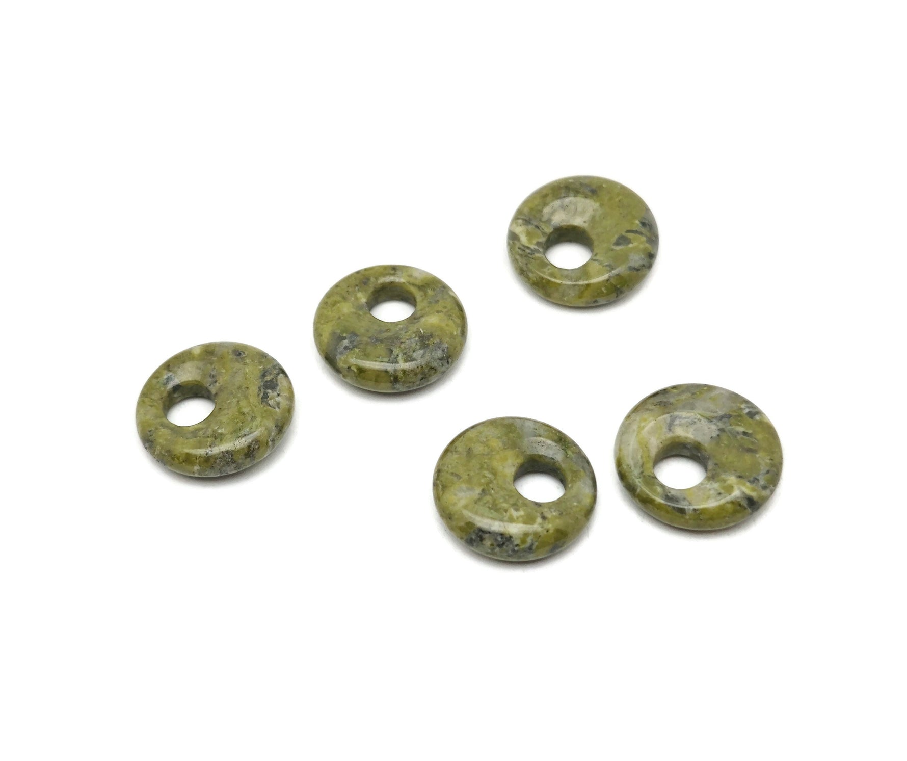Unakite crystal donut pendant, 18mm Pi stone from GemstoneGO, showcasing vibrant green and pink mineral patterns.
