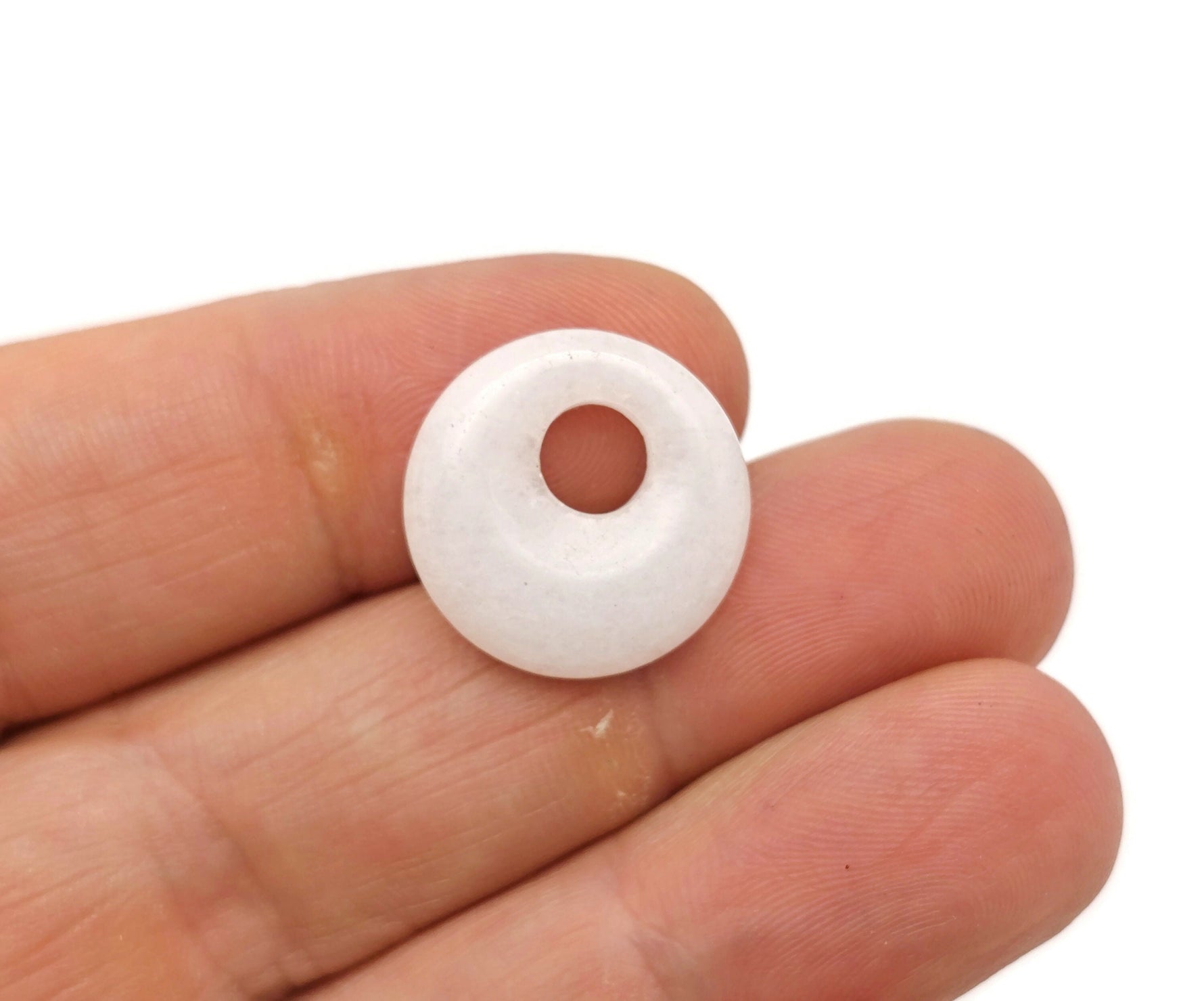 White Jade crystal donut pendant with 18mm Pi Stone, showcasing smooth, polished white gemstone with intricate swirl details.