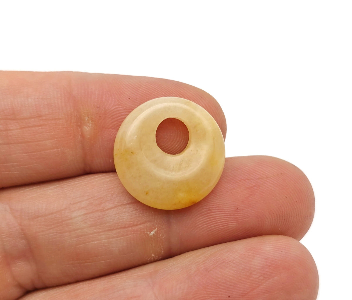 Yellow jade crystal donut pendant, 18mm Pi stone with vibrant yellow color, handcrafted by GemstoneGO for jewelry accessories.