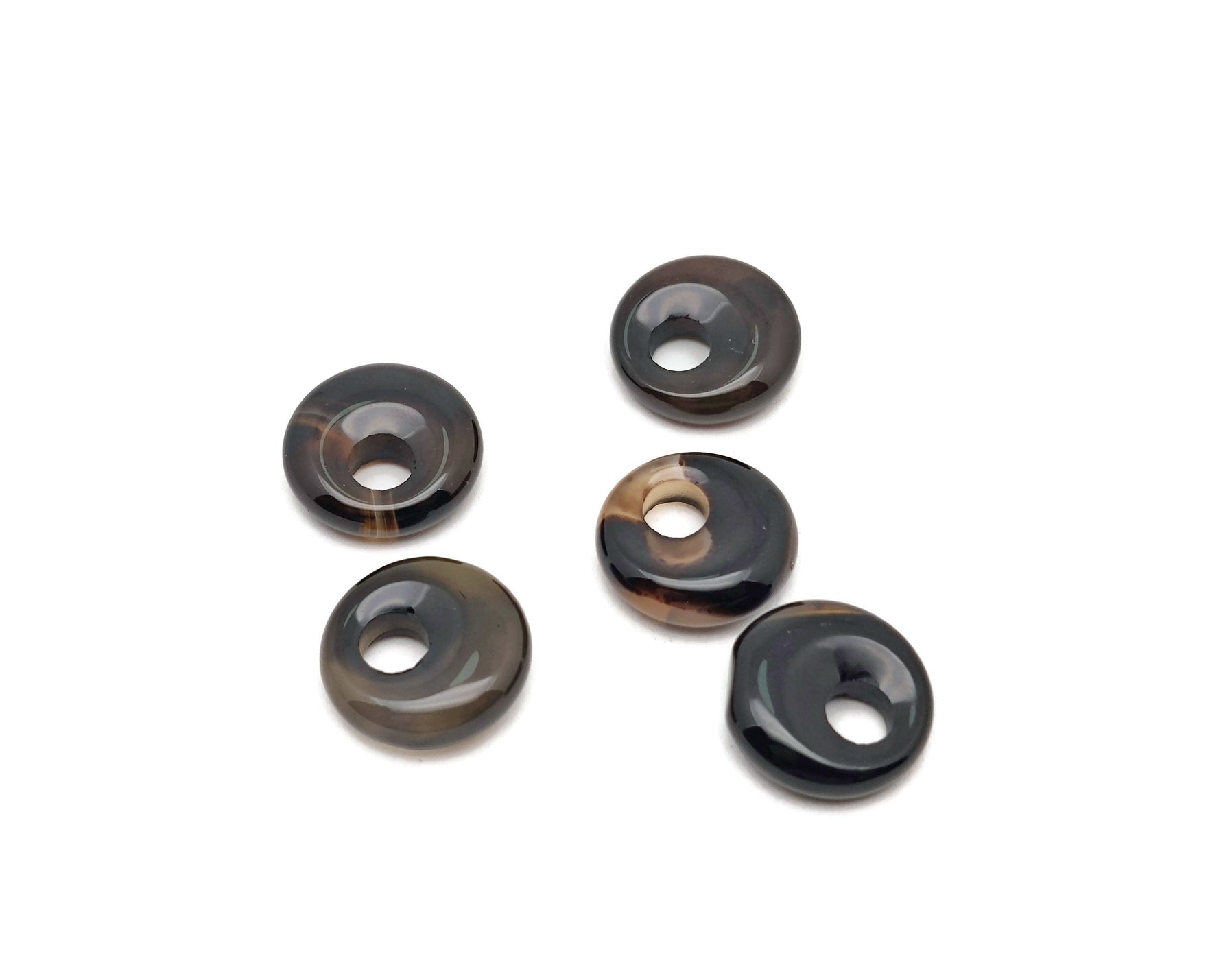 Black Agate crystal donut pendant with a Pi symbol, 18mm, from GemstoneGO featuring polished black agate stone.