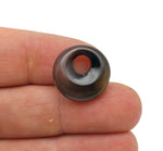 Black agate crystal donut pendant, 18mm Pi stone by GemstoneGO, showcasing a smooth, polished black agate gemstone with a donut shape.