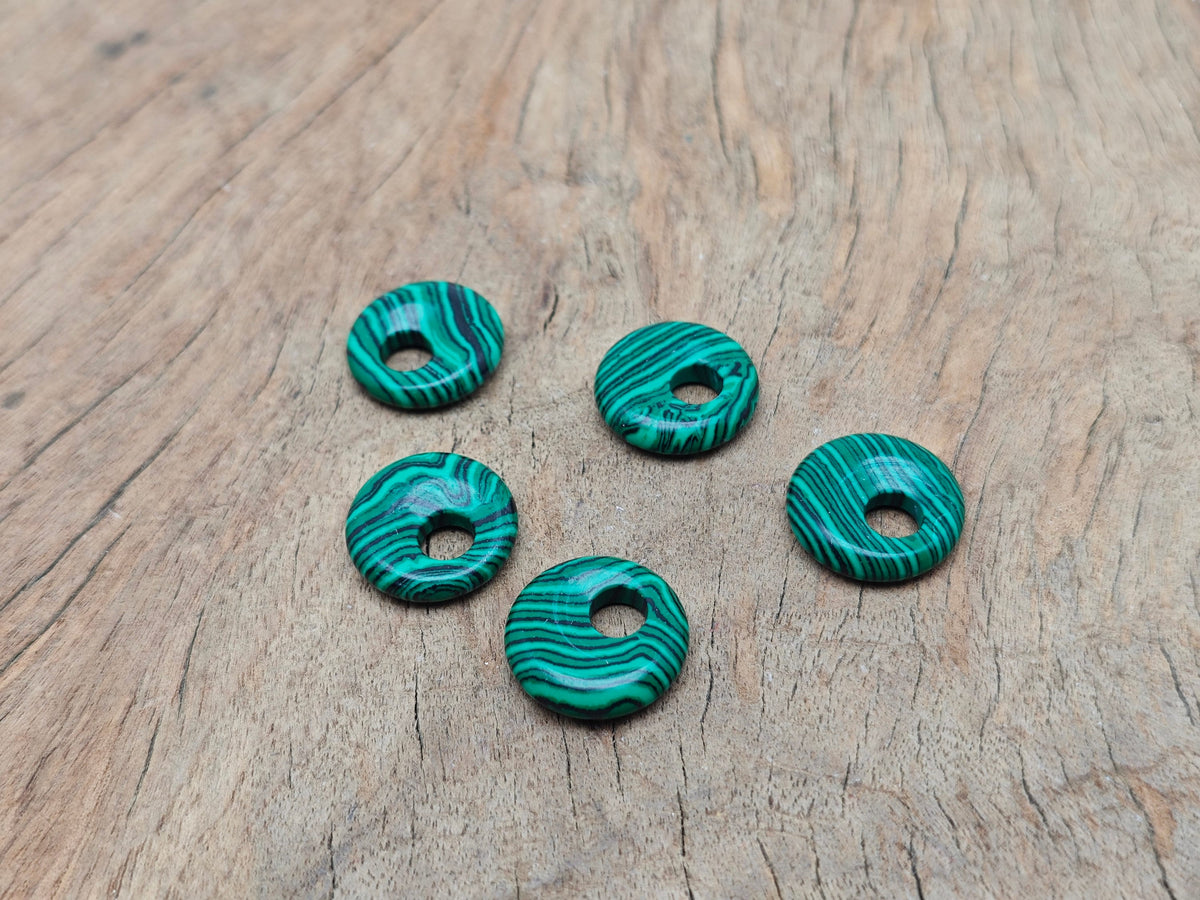 Malachite synthetic crystal donut pendant, 18mm Pi Stone by GemstoneGO, featuring vibrant green and black swirling patterns.