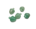 A carved aventurine crystal acorn gemstone, 26mm, used as a home crystal decoration, with detailed natural stone texture.