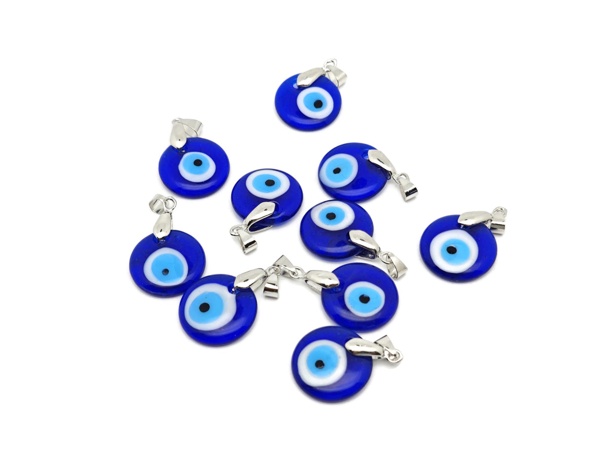 Glass evil eye pendant jewelry featuring a blue evil eye design on a silver chain, crafted by GemstoneGO.