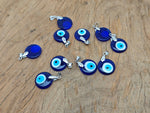 Glass evil eye pendant from GemstoneGO featuring vibrant blue and white colors, perfect for gift jewelry or protective accessories.