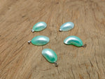 Green natural pearl pendant from GemstoneGO, showcasing a handcrafted jewelry piece with a smooth, lustrous pearl and crystal accents.
