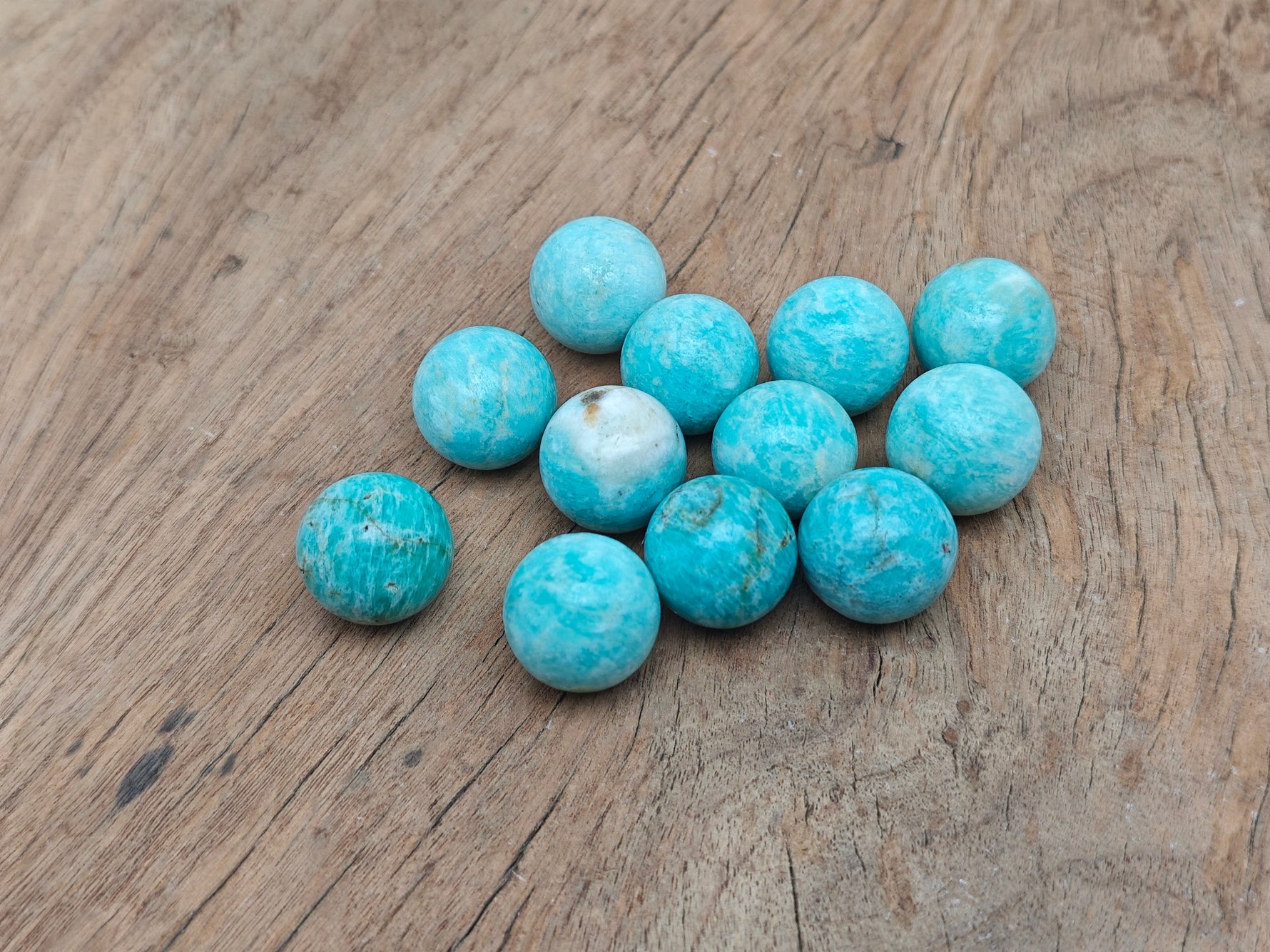 20mm Amazonite gemstone sphere, smooth crystal ball with vibrant blue-green color, by GemstoneGO.