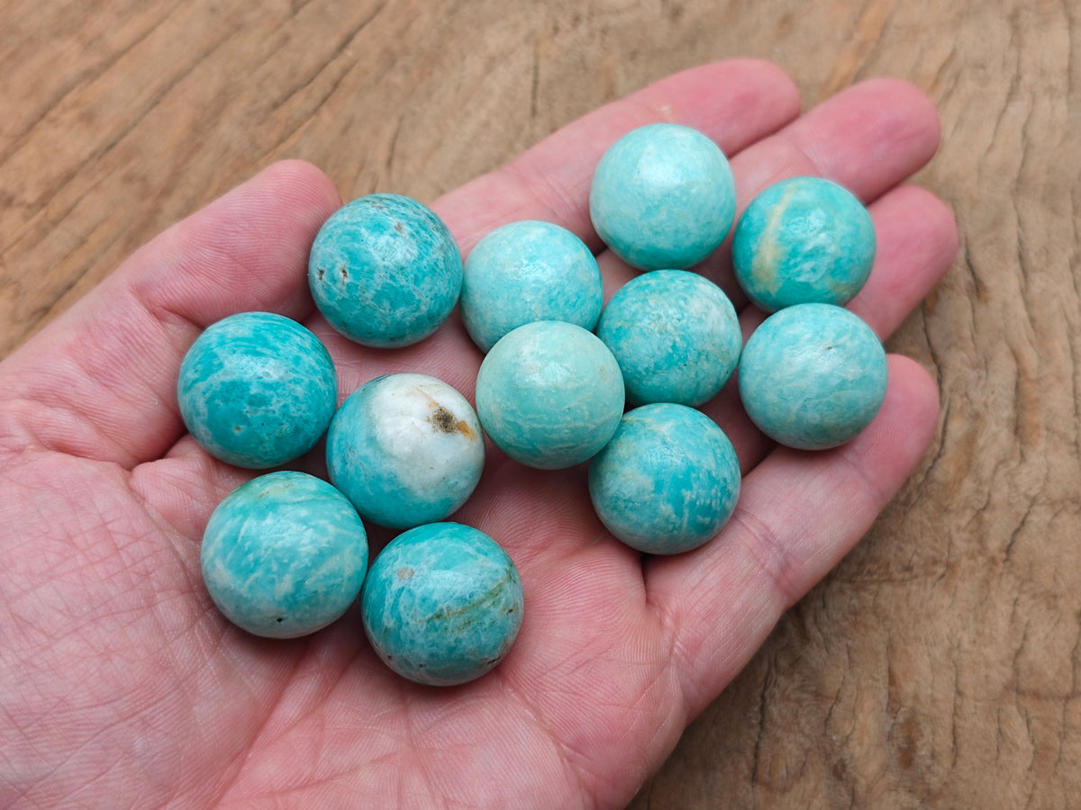 20mm Amazonite gemstone sphere, smooth crystal ball from GemstoneGO, showcasing vibrant blue-green mineral with natural patterns
