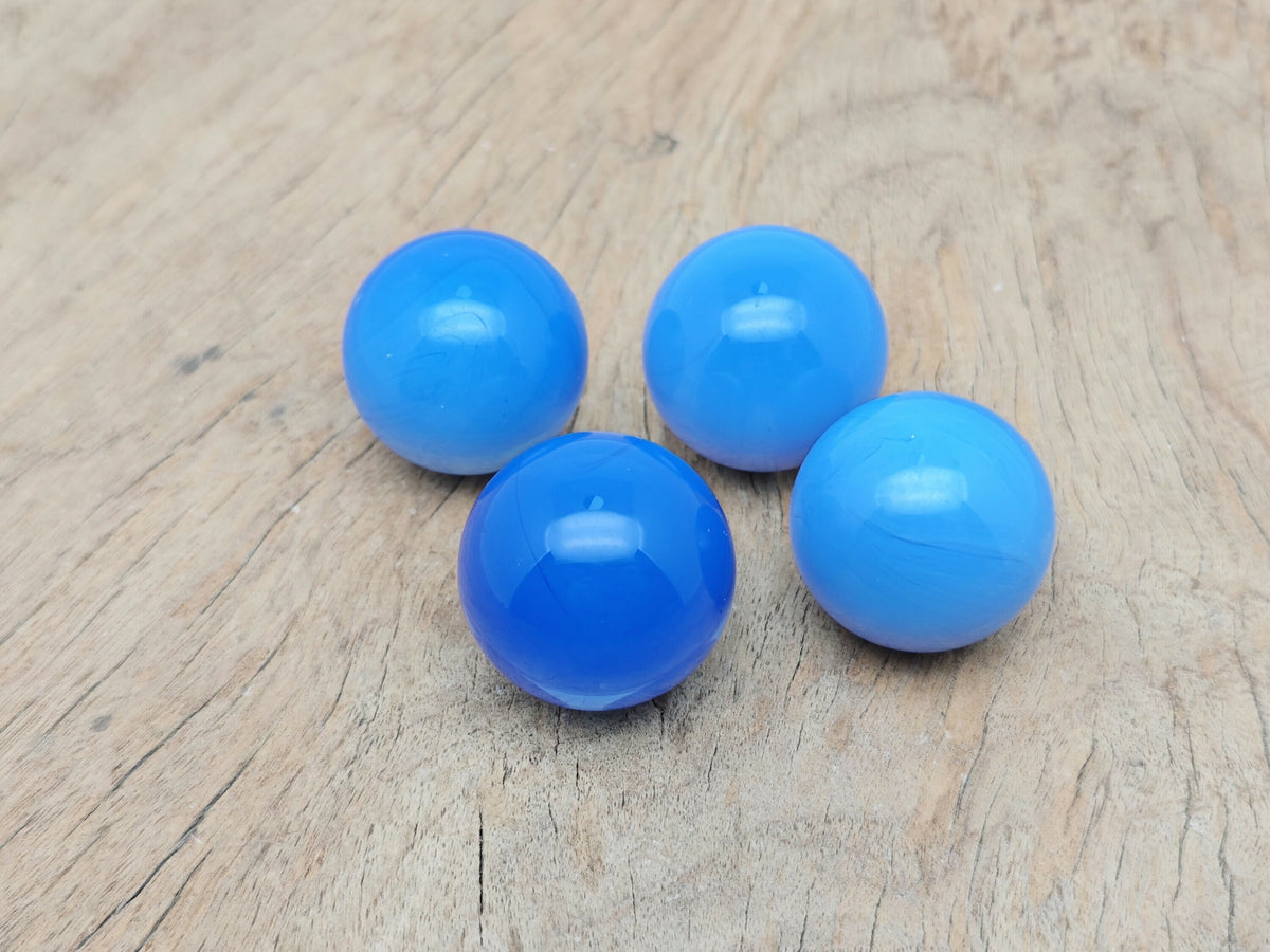 Blue opalite sphere gemstone crystal ball, 33-35mm size, showcasing a smooth, polished blue opalite gemstone with swirling patterns.