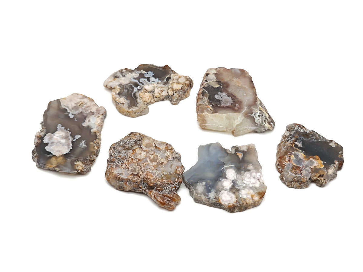 Flower Agate flat gemstone slab with cherry blossom pattern, showcasing vibrant pink and white crystal details.