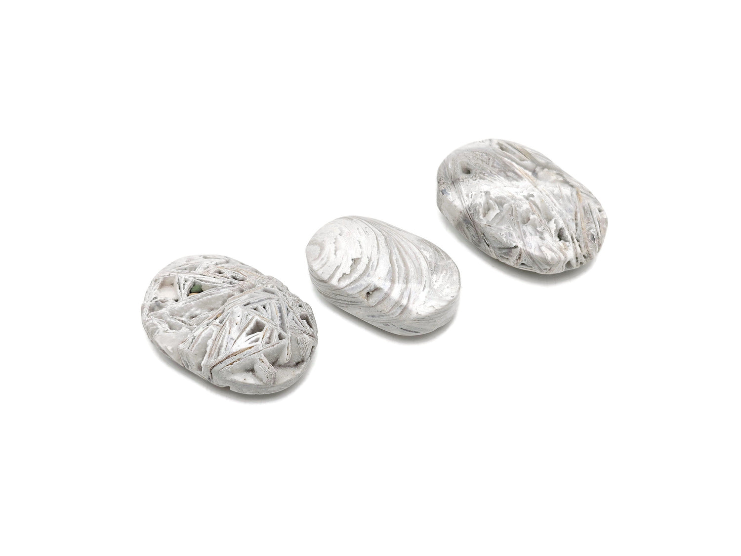 Mexican White Agate palm gemstone spa stone from GemstoneGO, showcasing smooth, polished white agate with natural banding patterns.