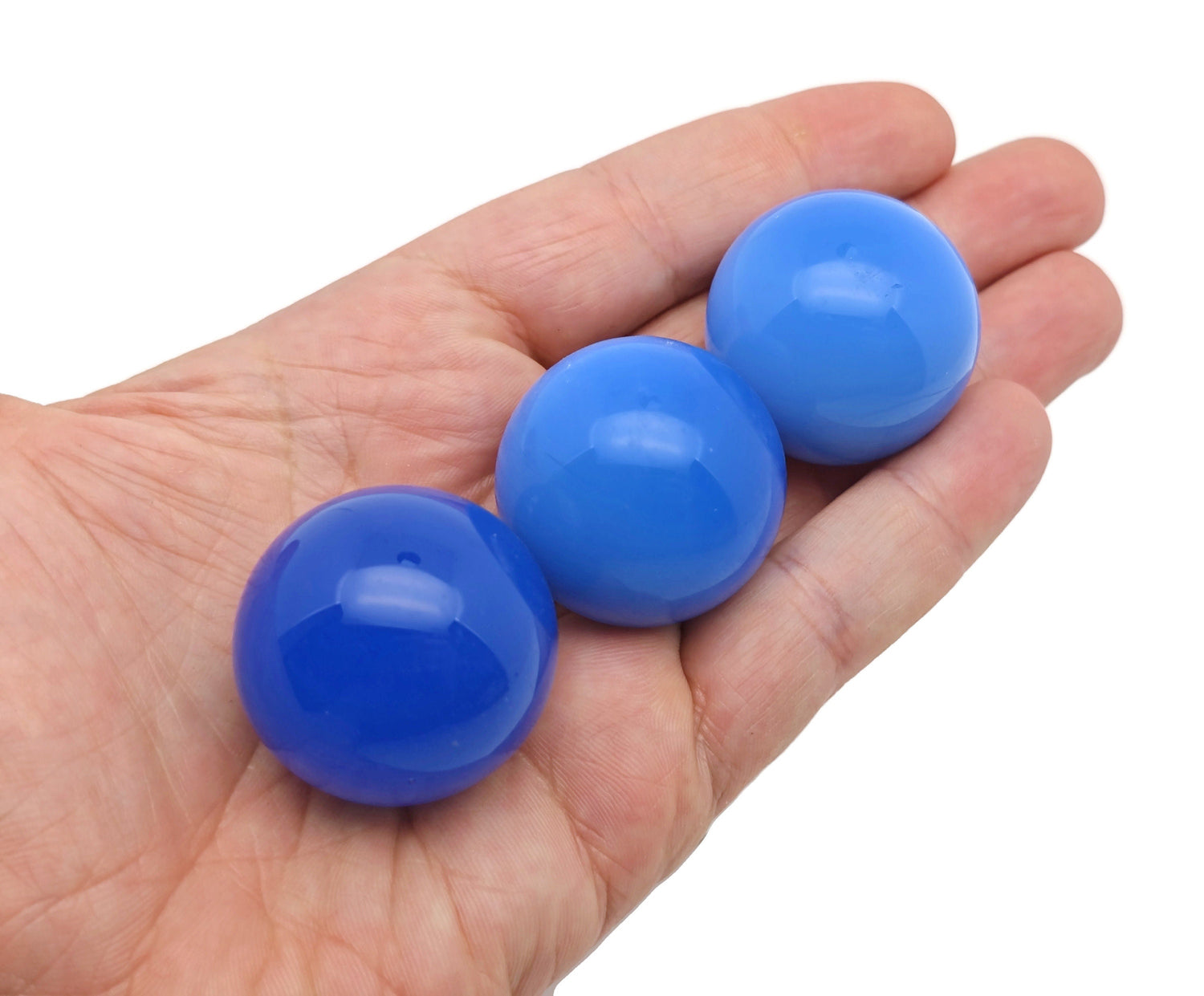 Blue Opalite gemstone sphere, 33-35mm crystal ball from GemstoneGO, showcasing a smooth, polished blue opalite with vibrant color and translucency.