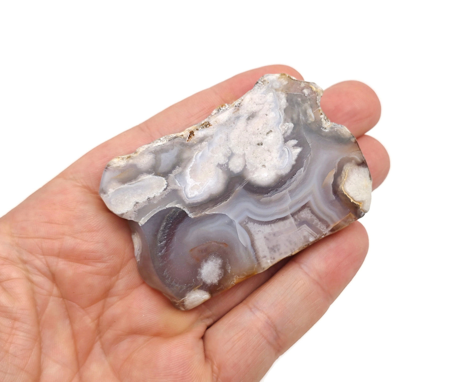 Flower Agate flat gemstone slab featuring cherry blossom patterns, showcasing vibrant colors and intricate crystal details.