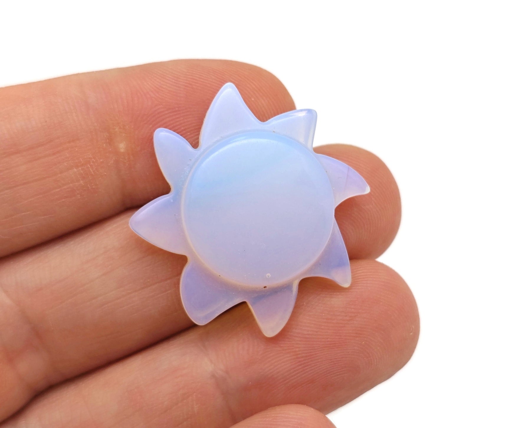 Colorful Sun gemstone carved pendant for jewelry making by GemstoneGO, displayed on a neutral background.