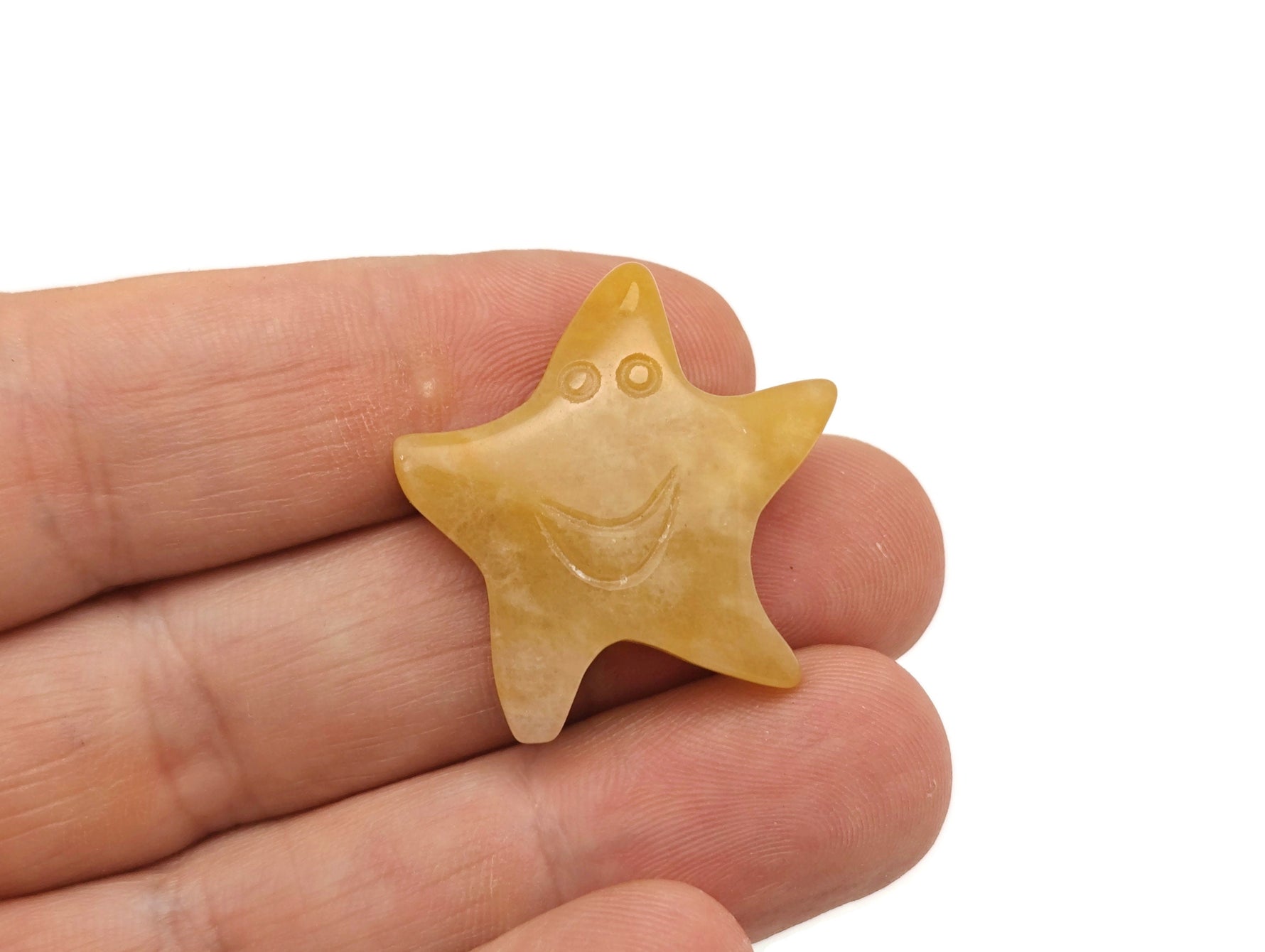 Mini crystal star gemstone from GemstoneGO, colorful handcrafted crystal star for jewelry making and decorative crafts.
