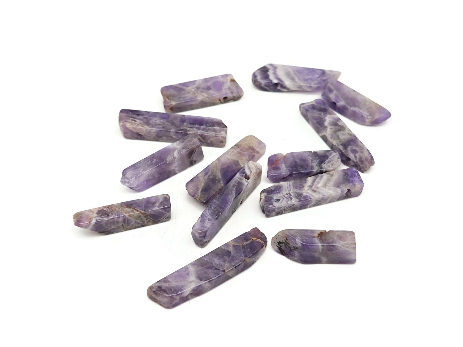 Dream amethyst drilled tumbled gemstone pendant with a rectangular hole, suitable for jewelry making, by GemstoneGO.