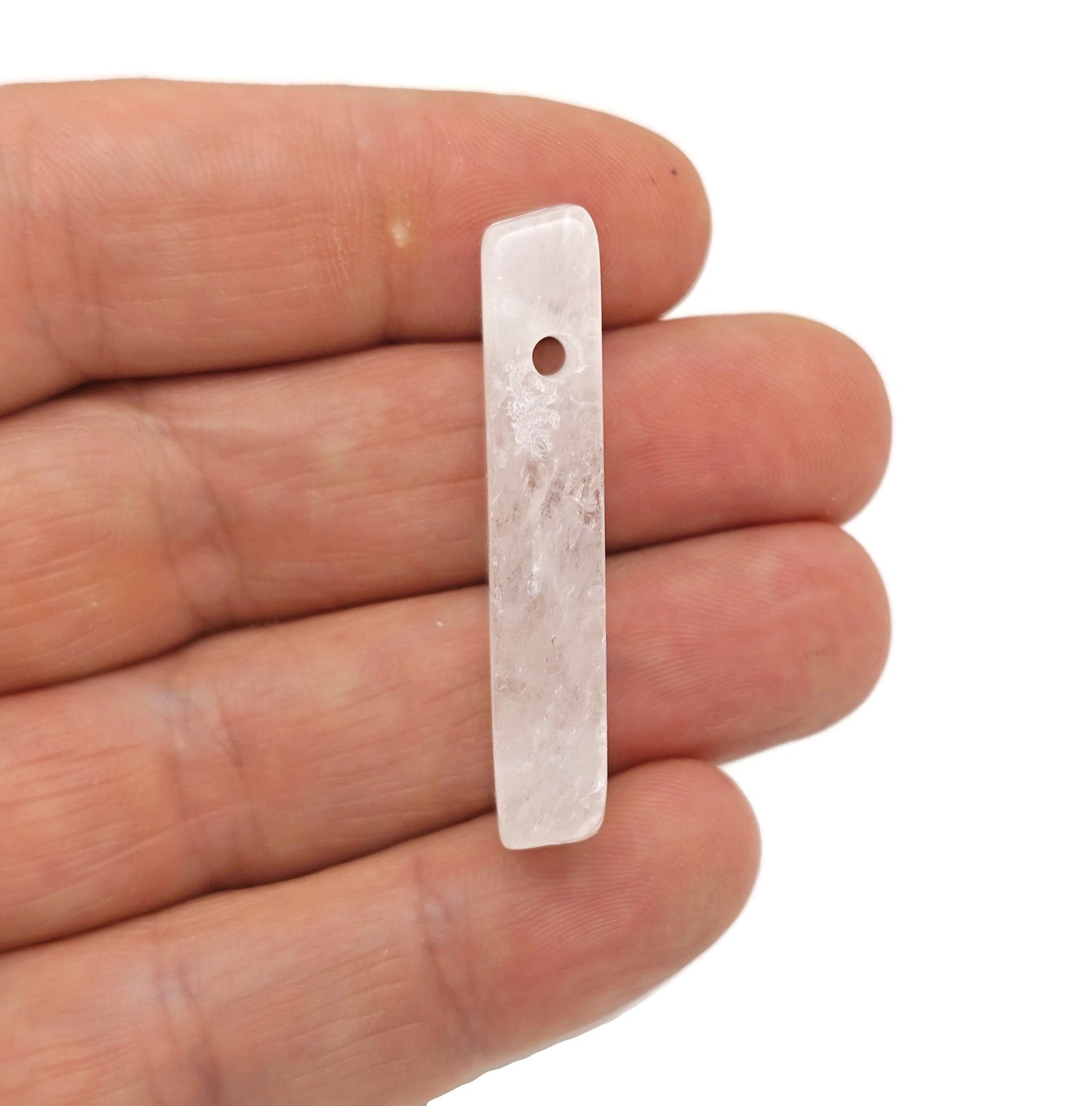 Clear quartz tumbled gemstone pendant with drilled rectangular hole, ideal for making jewelry, from GemstoneGO.