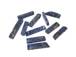 Sodalite drilled tumbled gemstone pendant from GemstoneGO showcasing a deep blue, polished stone with natural veining and a drilled hole for jewelry.