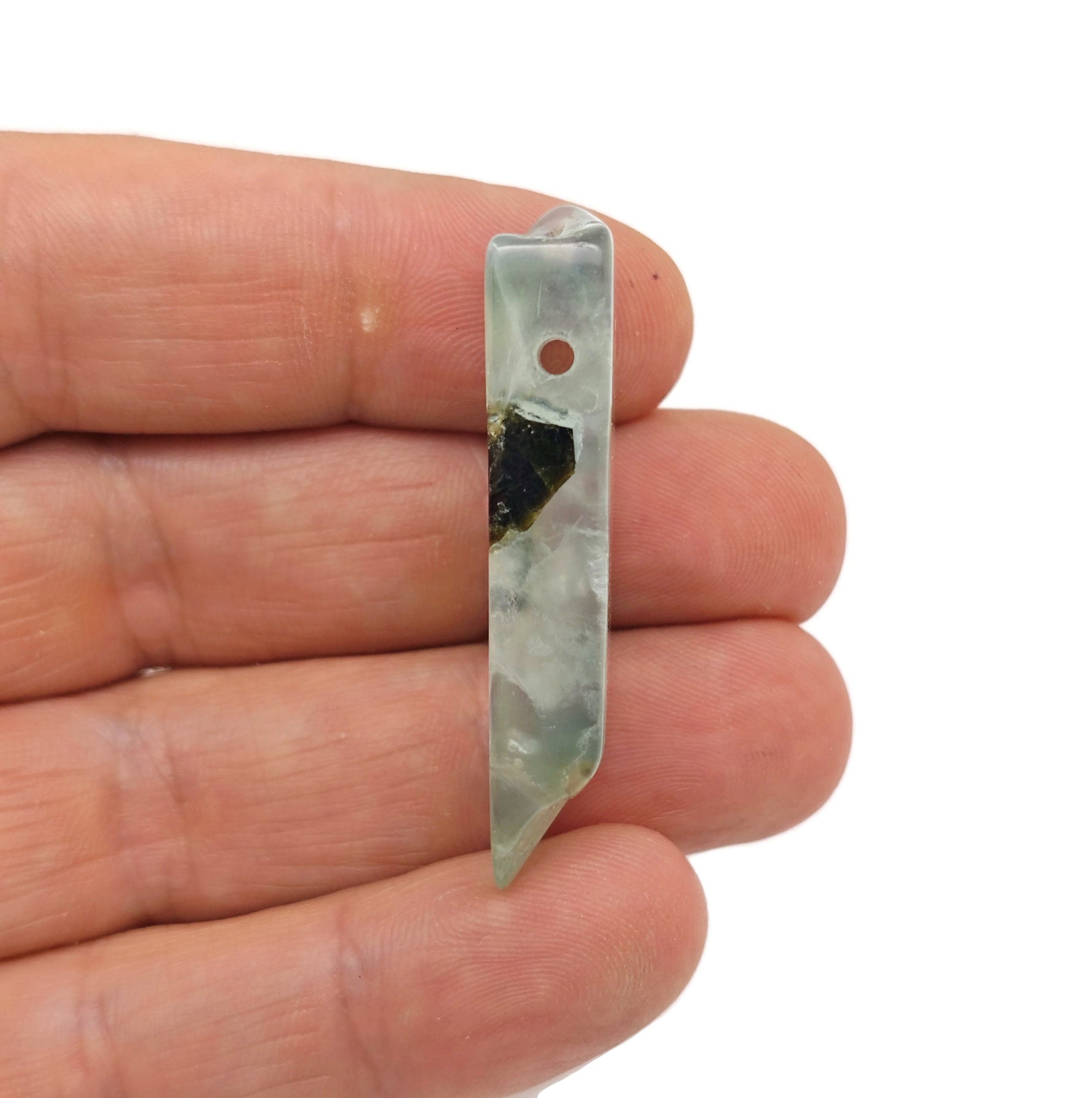 Prehnite drilled tumbled gemstone pendant from GemstoneGO, showcasing smooth, green stone with a drilled hole for jewelry making.