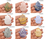 Evil Eye hand gemstone carving, pocket crystal for meditation and chakra healing, from GemstoneGO.