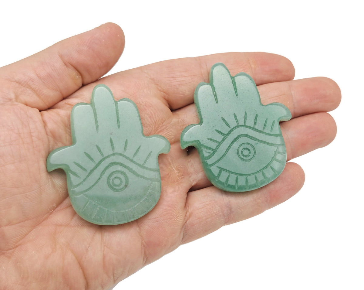 Evil Eye hand gemstone carving pocket crystal with intricate details, chakra meditation crystal from GemstoneGO.
