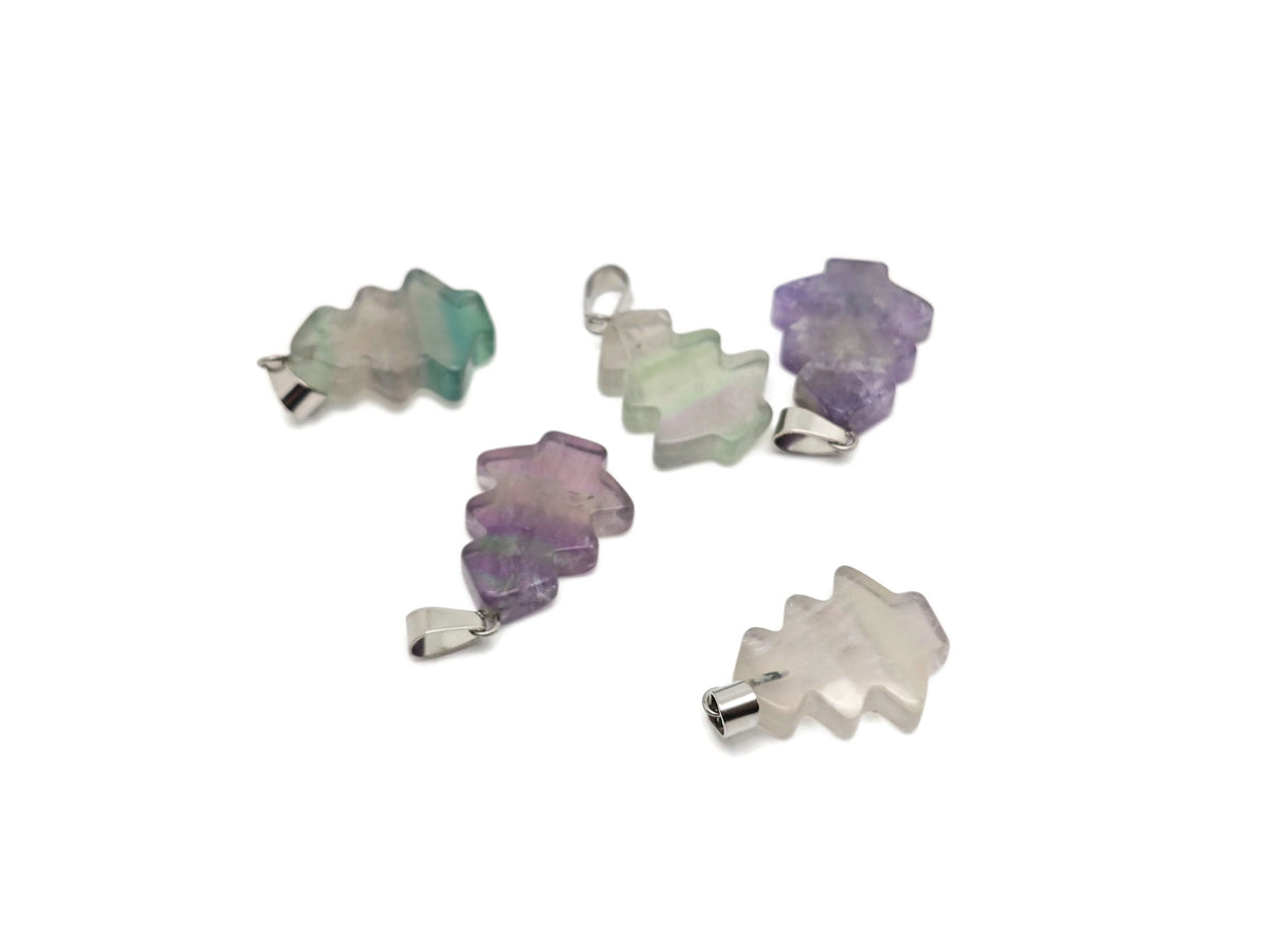 Mini fluorite pine tree gemstone pendant from GemstoneGO featuring vibrant green and purple crystals on a silver chain.