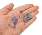 Mini fluorite pine tree gemstone pendant from GemstoneGO featuring vibrant green and purple hues, displayed on a chain.
