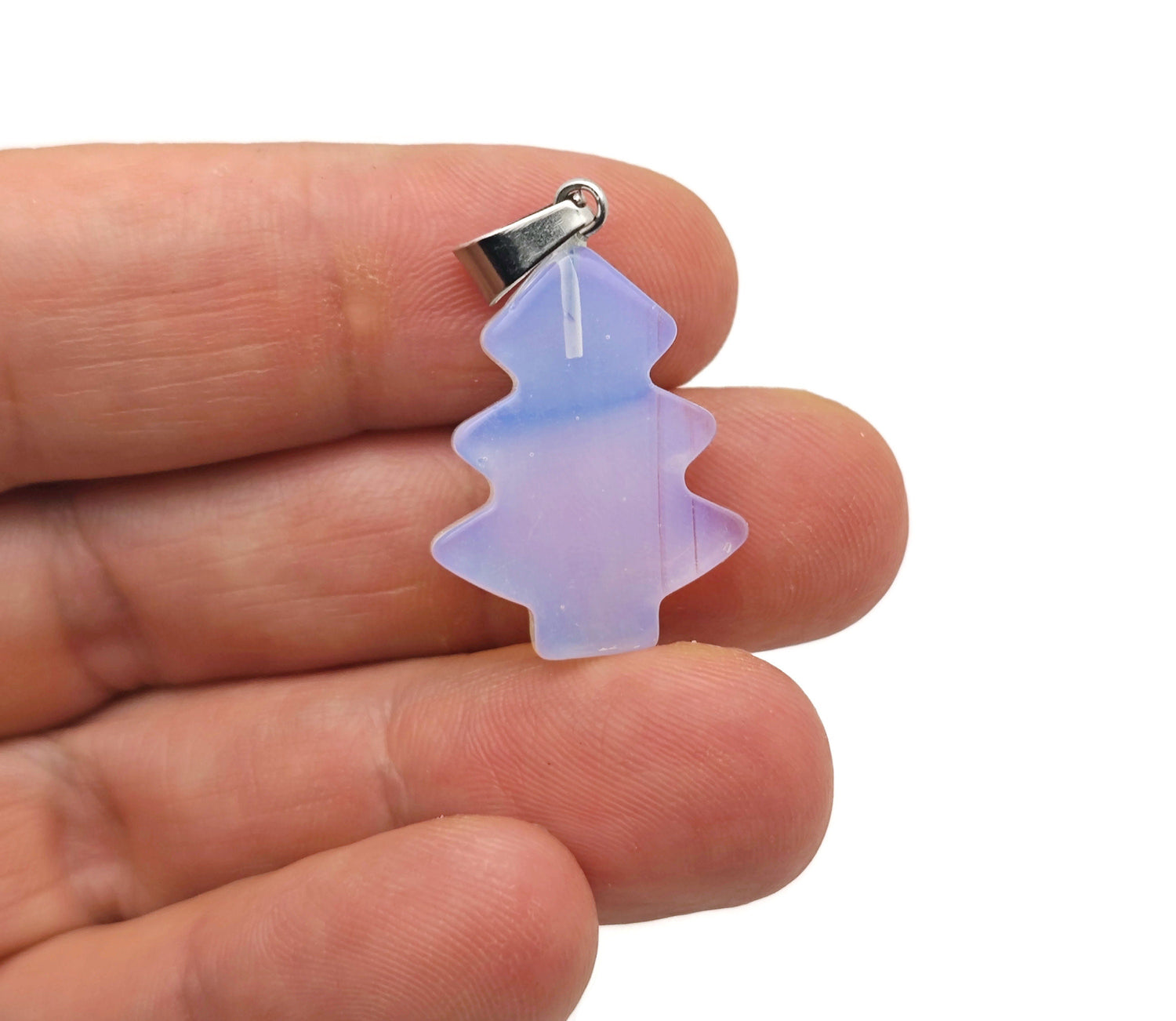 Mini opalite pine tree gemstone pendant by GemstoneGO featuring a crystal design on a silver chain.