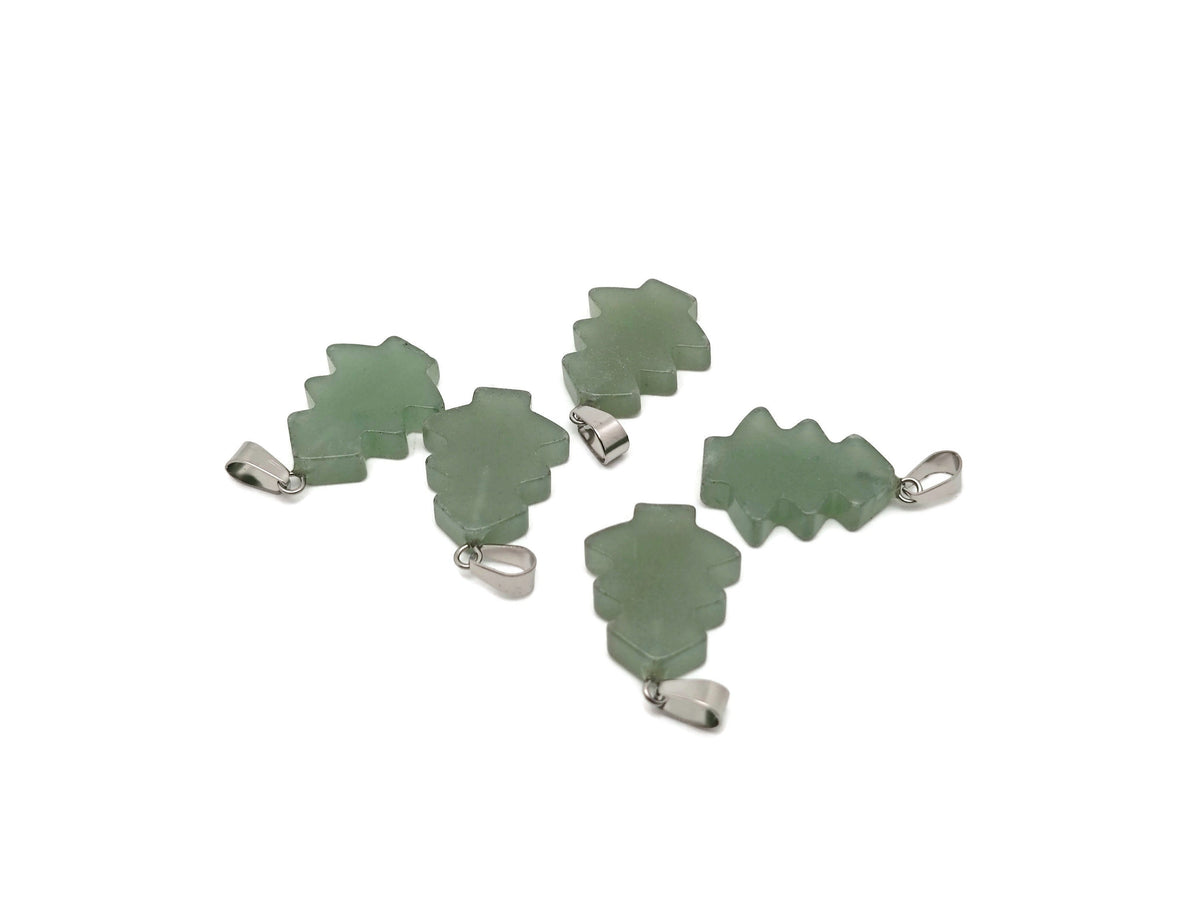 Mini aventurine gemstone pine tree pendant from GemstoneGO, featuring green crystal details on a silver chain.
