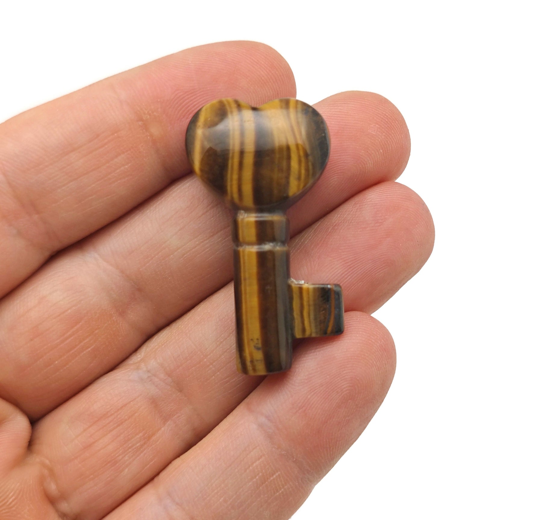 Tiger Eye gemstone carving key with 40mm size from GemstoneGO, featuring a polished, detailed tiger eye design.