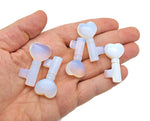 Opalite gemstone key carving, 40mm size, detailed gemstone sculpture from GemstoneGO featuring a smooth, polished finish.