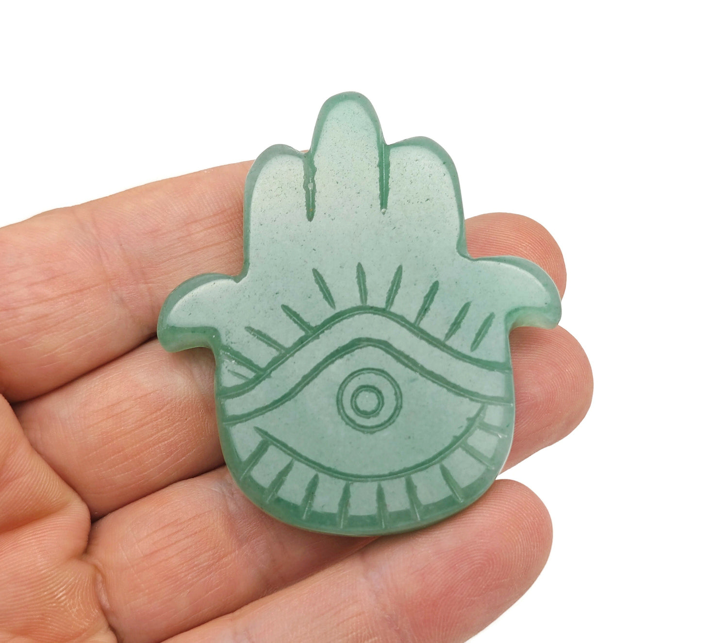 Aventurine evil eye hand gemstone carving with intricate details, showcasing a vibrant green gemstone sculpture by GemstoneGO.