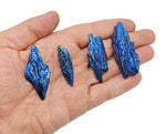 Aura Kyanite fan gemstone in various colors, raw crystal with a fan shape, showcasing vibrant natural mineral textures.
