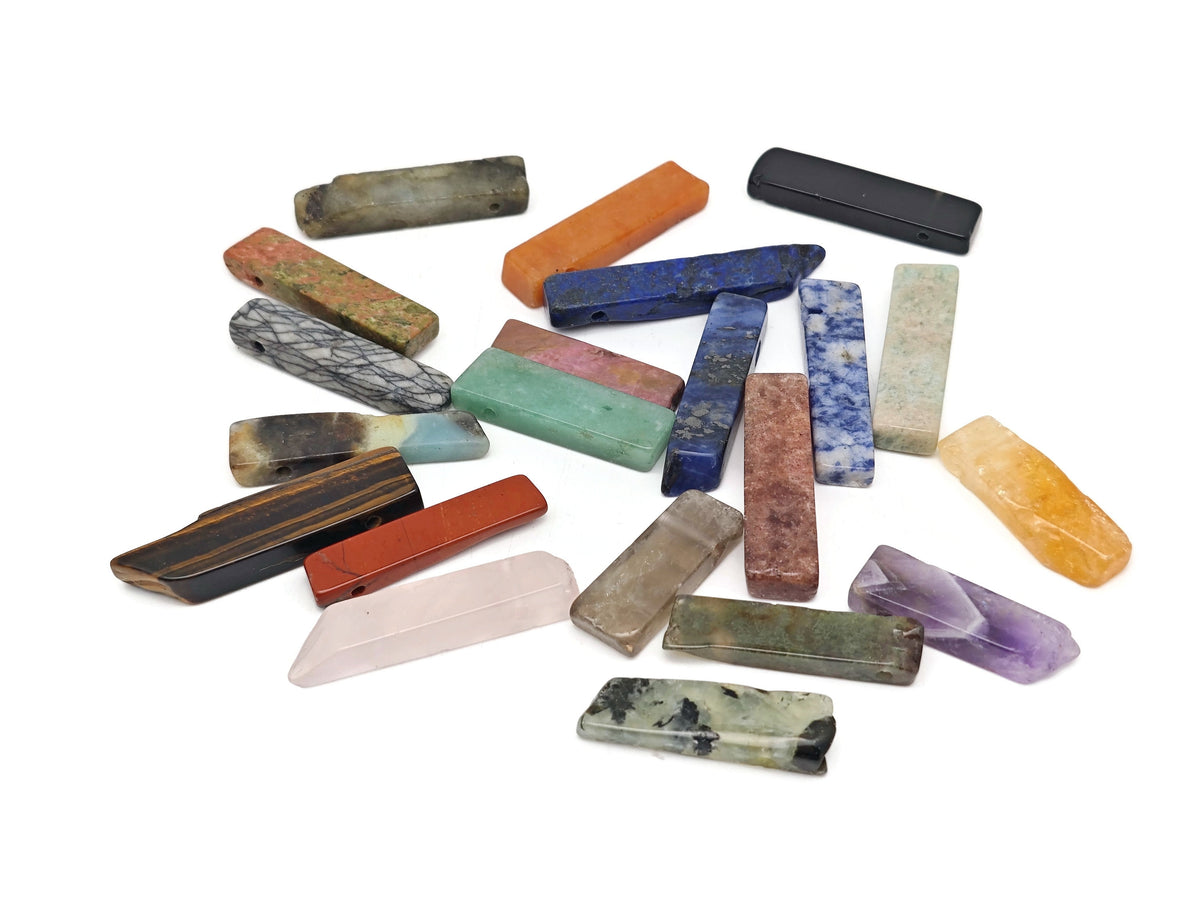 Rectangular drilled tumbled gemstone pendant from GemstoneGO featuring a natural spiritual stone in a mixed bulk set.