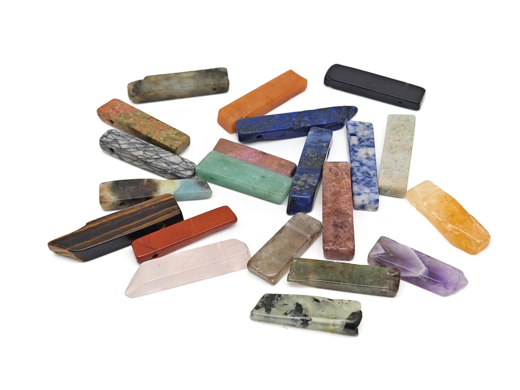 Rectangular drilled tumbled gemstone pendant from GemstoneGO featuring a natural spiritual stone in a mixed bulk set.