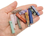 Drilled tumbled gemstone pendant with rectangular hole, showing colorful spiritual stones in a mix for jewelry making by GemstoneGO.