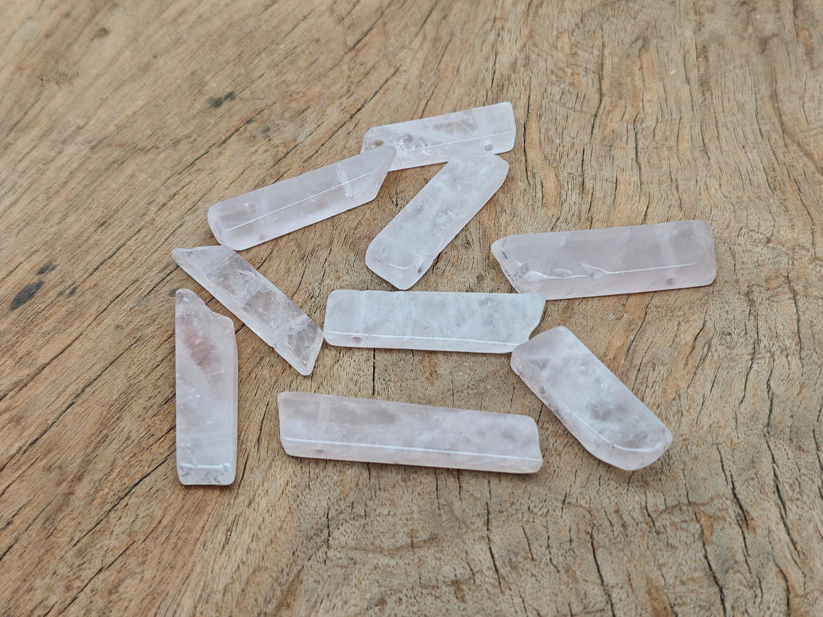 Rose quartz tumbled gemstone pendant with drilled hole, natural pink stone from GemstoneGO.