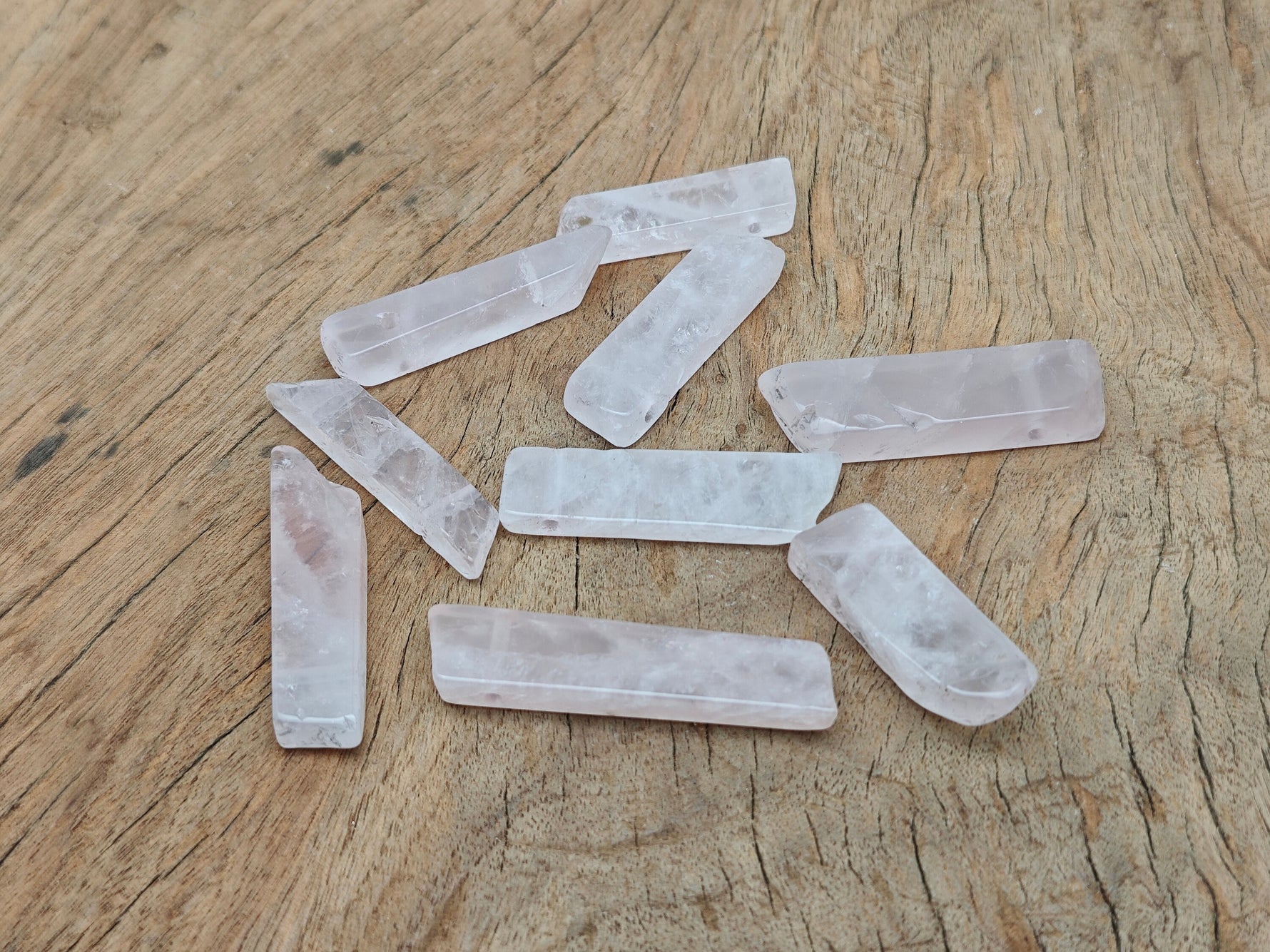 Rose quartz tumbled gemstone pendant with drilled hole, natural pink stone from GemstoneGO.