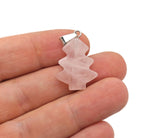 Mini rose quartz gemstone pendant in the shape of a pine tree, featuring a clear crystal and natural pink hue.