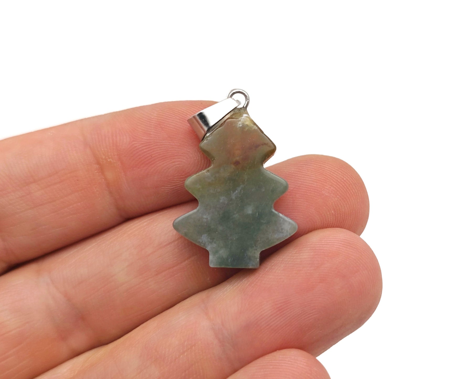 Mini moss agate pine tree gemstone pendant featuring a polished moss agate stone with a detailed pine tree design.