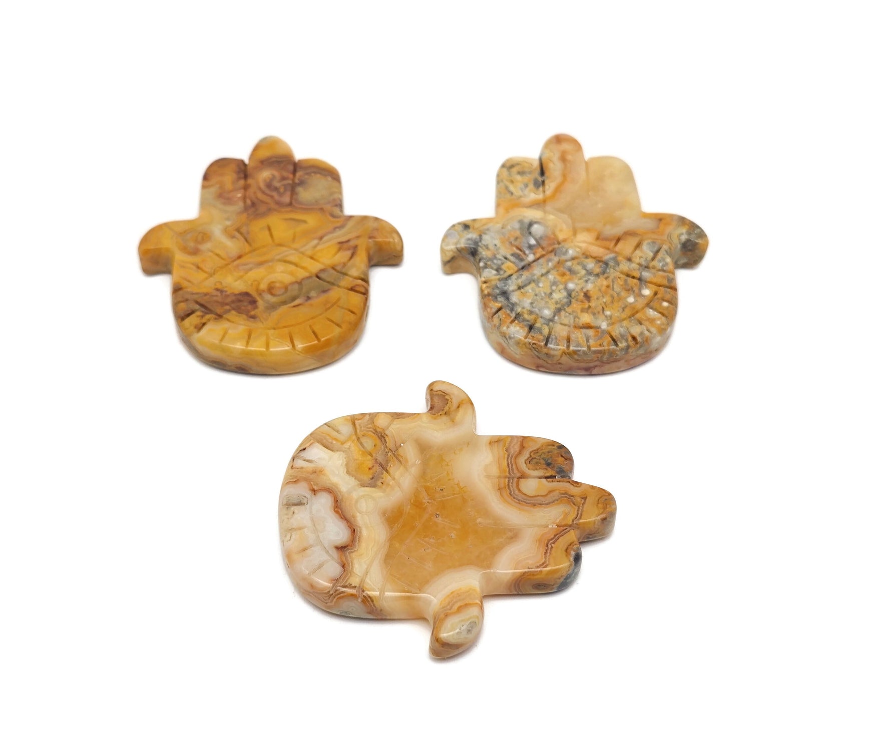 Hand-carved Crazy Lace Agate Evil Eye gemstone pendant from GemstoneGO, featuring vibrant, intricate lace patterns and a protective evil eye design.