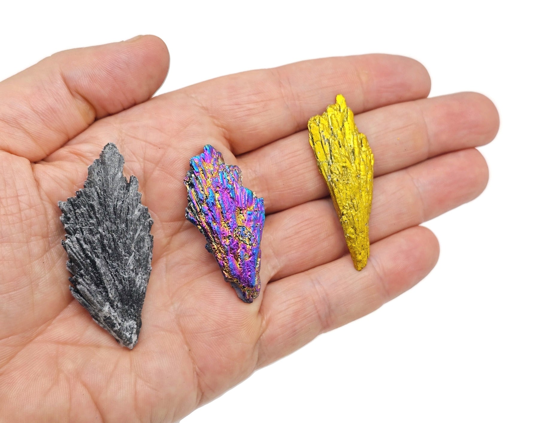 Aura Kyanite fan gemstone in various colors, raw stone with layered crystal fan shape, from GemstoneGO.