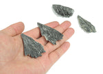 Aura Kyanite fan gemstone in various colors, raw crystal form, showcasing vibrant, natural mineral textures and fan-shaped structure.