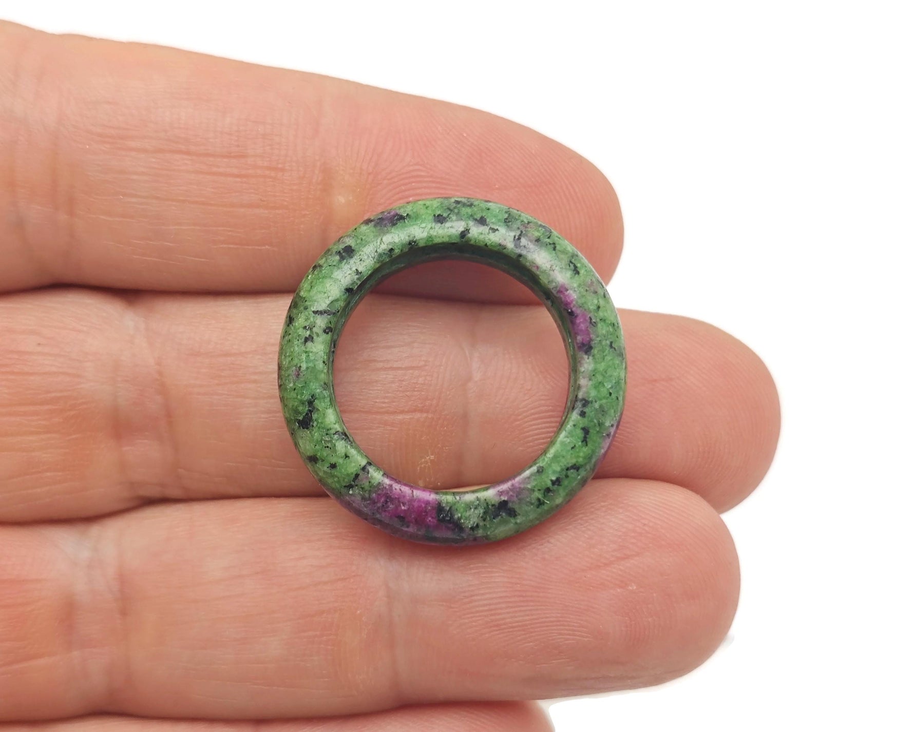 Ruby zoisite crystal ring by GemstoneGO featuring a vibrant green and red gemstone set in a silver band.