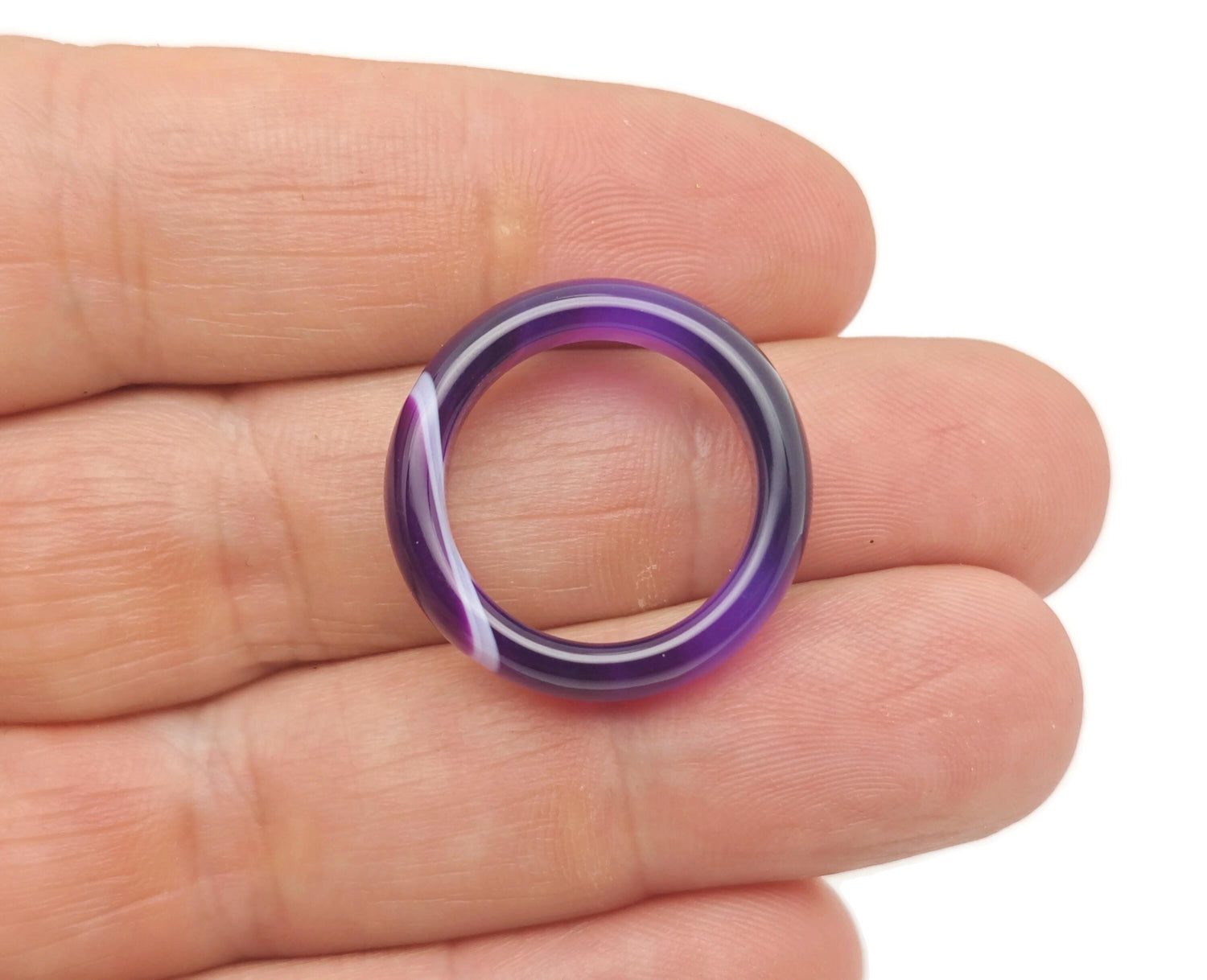 Purple agate crystal ring from GemstoneGO featuring a vibrant purple agate stone set in a stylish silver band.